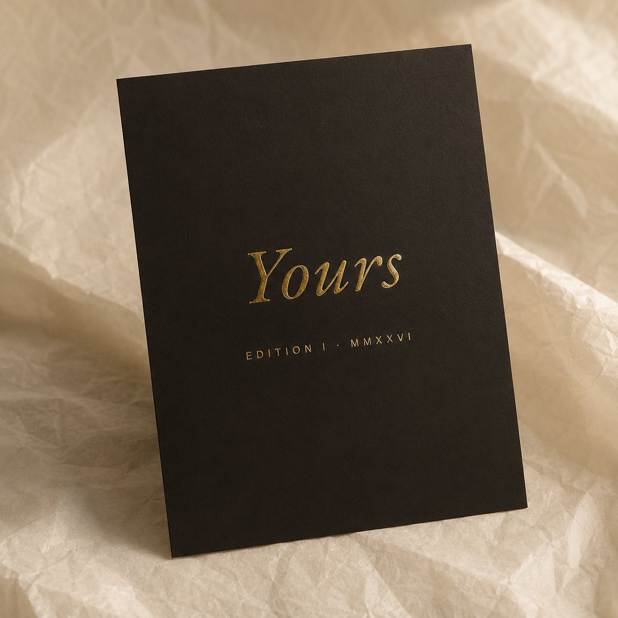 The back of the closing card — the Yours wordmark and a scattered field of small stars in gold foil on a warm-dark soft-touch ground
